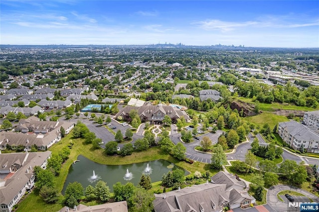 49 Quarry Dr, Woodland Park, NJ 07424 - aerial view of property and surrounding area featuring a large body of water and nearby suburban area