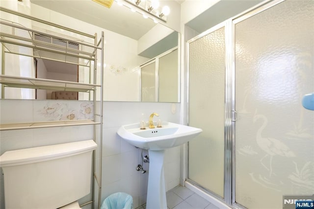 47 Venna Ave, North Haledon, NJ 07508 - full bathroom with toilet, a shower stall, tile patterned floors, and a sink