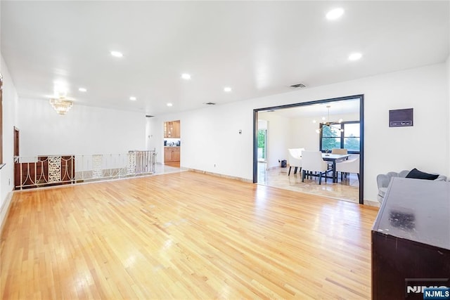 47 Venna Ave, North Haledon, NJ 07508 - living room featuring a chandelier, light wood-style floors, and recessed lighting