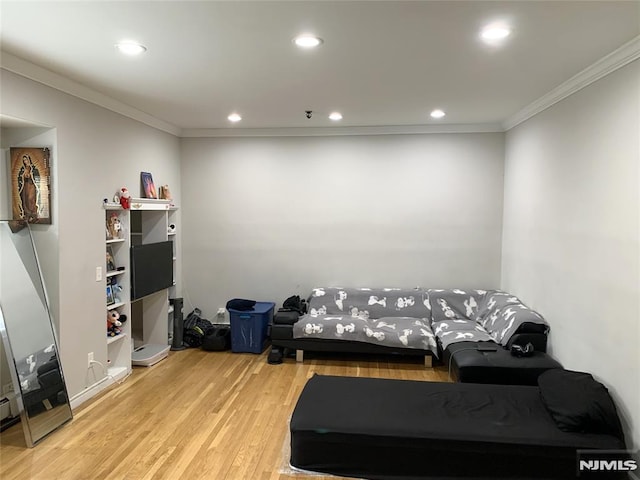 116 W 19th St Unit 1A, Bayonne, NJ 07002 - living area featuring ornamental molding, wood finished floors, and recessed lighting