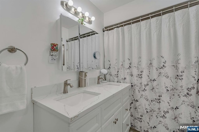 full bathroom with double vanity