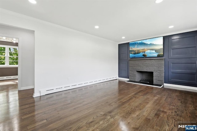 8 Oak St, Netcong Borough, NJ 07857 - unfurnished living room featuring a baseboard heating unit, crown molding, recessed lighting, dark wood-type flooring, and a fireplace