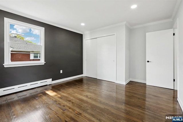 8 Oak St, Netcong Borough, NJ 07857 - unfurnished bedroom featuring crown molding, a closet, wood finished floors, recessed lighting, and a baseboard radiator