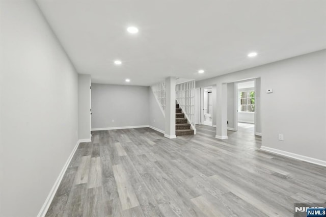 8 Oak St, Netcong Borough, NJ 07857 - below grade area with recessed lighting, stairs, light wood-style flooring, and baseboards