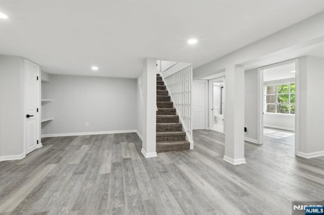 8 Oak St, Netcong Borough, NJ 07857 - below grade area with recessed lighting, wood finished floors, stairway, and baseboards