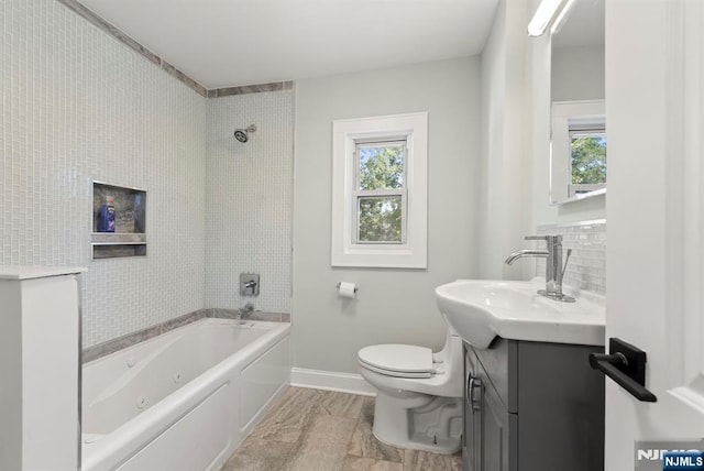 240 Berry St, Hackensack, NJ 07601 - bathroom featuring baseboards, plenty of natural light, vanity, and toilet