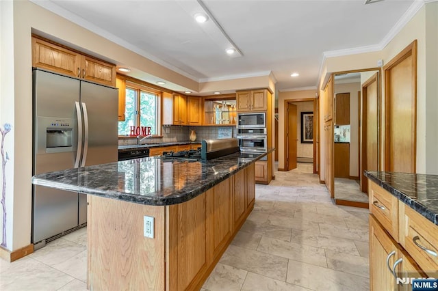 81 Columbus Ave, Totowa, NJ 07512 - kitchen with stainless steel appliances, ornamental molding, backsplash, a center island, and dark stone counters