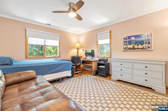 81 Columbus Ave, Totowa, NJ 07512 - bedroom featuring a baseboard heating unit, multiple windows, crown molding, and a ceiling fan