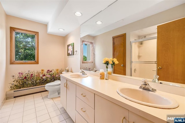 81 Columbus Ave, Totowa, NJ 07512 - bathroom featuring baseboard heating, toilet, double vanity, a stall shower, and tile patterned floors