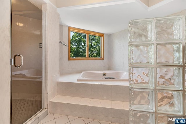 81 Columbus Ave, Totowa, NJ 07512 - full bathroom with tile patterned floors, a garden tub, and a shower stall