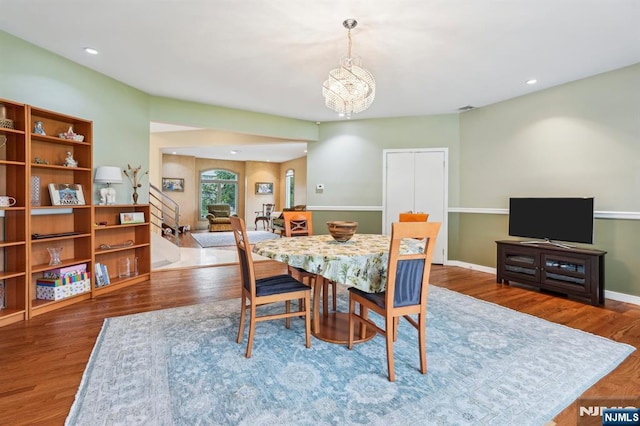 31 Bourbon St, Wayne, NJ 07470 - dining space with wood finished floors, a chandelier, baseboards, and recessed lighting