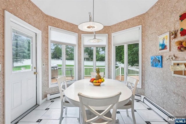 31 Bourbon St, Wayne, NJ 07470 - dining space featuring healthy amount of natural light, wallpapered walls, baseboard heating, and baseboards