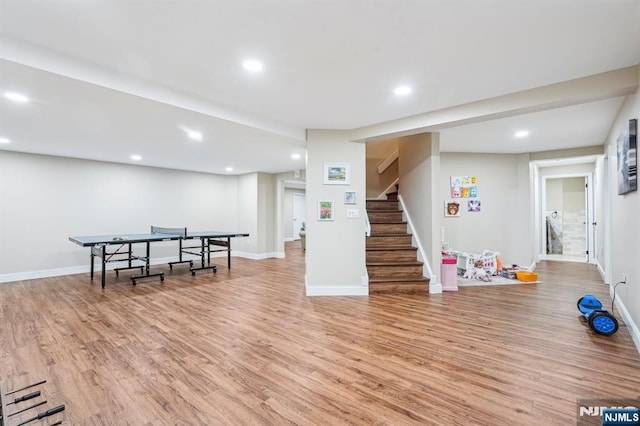31 Bourbon St, Wayne, NJ 07470 - recreation room with light wood-style flooring, recessed lighting, and baseboards