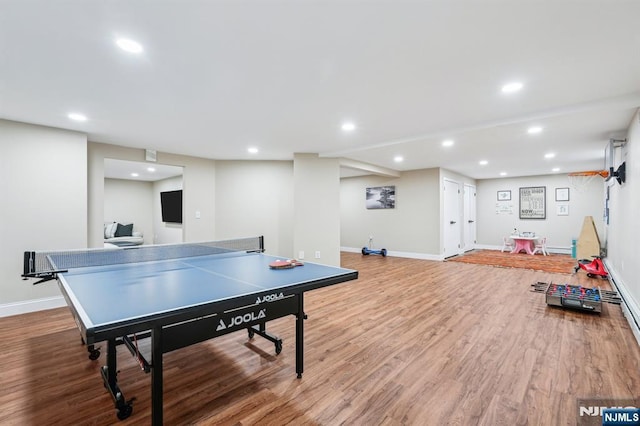 31 Bourbon St, Wayne, NJ 07470 - playroom featuring recessed lighting, wood finished floors, baseboards, and baseboard heating