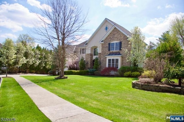 5 Young Ct, East Hanover Twp, NJ 07936 - traditional-style house featuring a front yard and stone siding