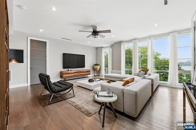 26 Hudson Ter, Edgewater, NJ 07020 - living room with wood finished floors, ceiling fan, recessed lighting, and baseboards