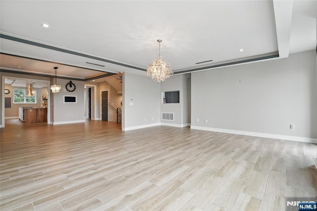 26 Hudson Ter, Edgewater, NJ 07020 - unfurnished living room featuring a chandelier, light wood-type flooring, baseboards, and recessed lighting