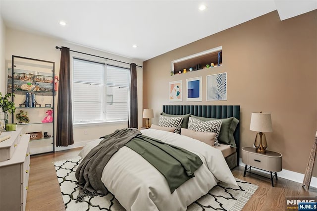 26 Hudson Ter, Edgewater, NJ 07020 - bedroom featuring light wood-type flooring, baseboards, and recessed lighting
