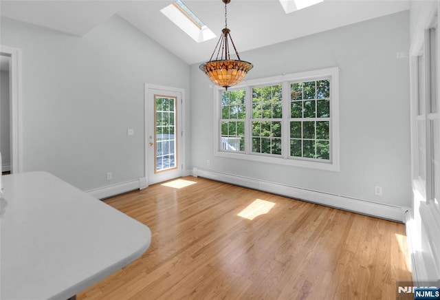27 Tecumseh Trl, Oakland, NJ 07436 - unfurnished dining area with a skylight, baseboard heating, healthy amount of natural light, and lofted ceiling