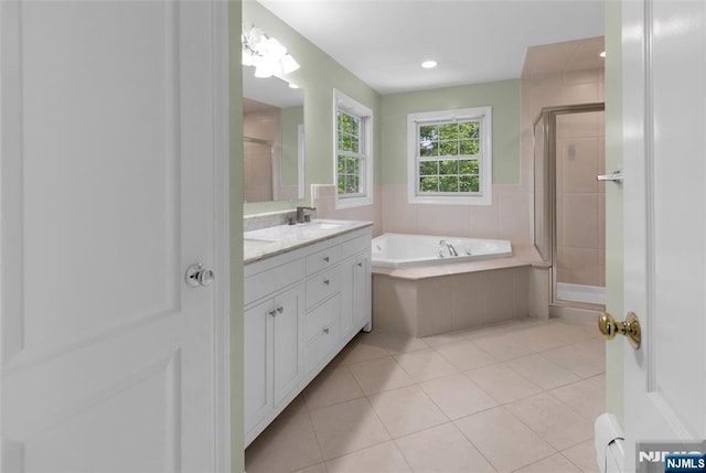 27 Tecumseh Trl, Oakland, NJ 07436 - full bath featuring double vanity, a shower stall, a garden tub, tile patterned flooring, and recessed lighting