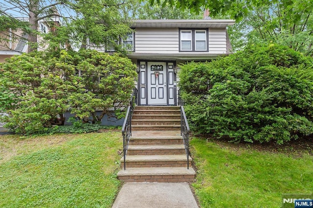 21 Spruce Ave, Ridgefield Park, NJ 07660 - view of front of property featuring a front yard