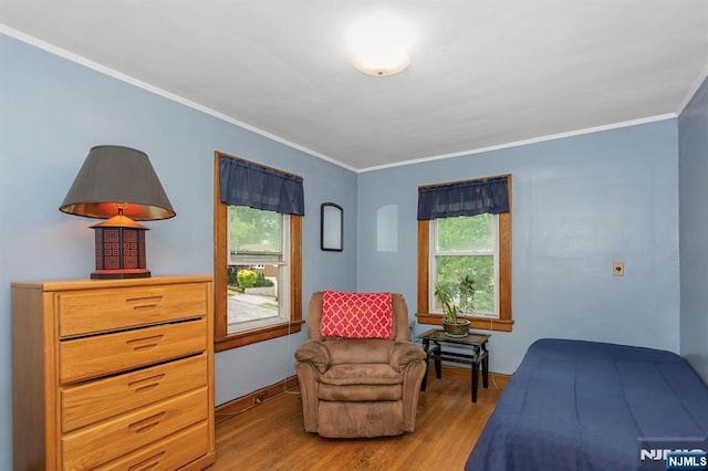 21 Spruce Ave, Ridgefield Park, NJ 07660 - bedroom featuring wood finished floors and ornamental molding