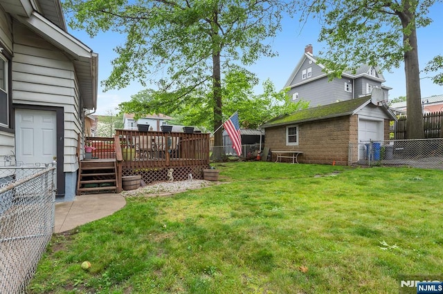 21 Spruce Ave, Ridgefield Park, NJ 07660 - fenced backyard with a deck and an outbuilding