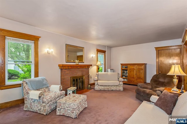 21 Spruce Ave, Ridgefield Park, NJ 07660 - carpeted living area featuring a fireplace and baseboards