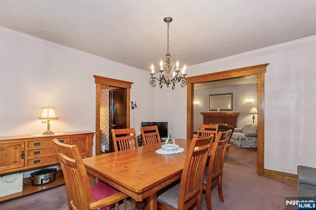 21 Spruce Ave, Ridgefield Park, NJ 07660 - dining area with dark colored carpet and a chandelier