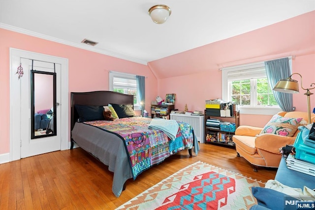 747 Mildred St, Teaneck, NJ 07666 - bedroom featuring wood-type flooring, crown molding, and vaulted ceiling