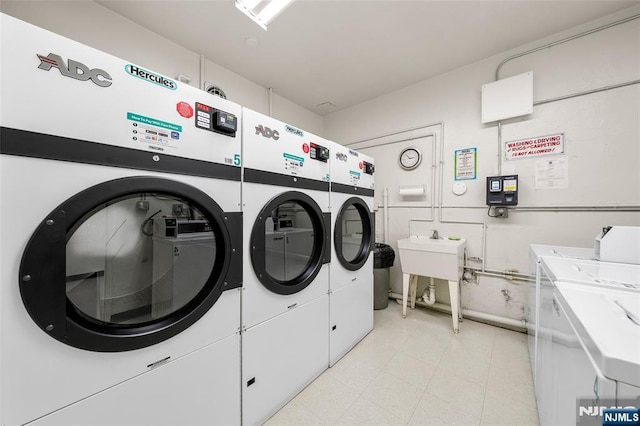 2180 Center 4B, Fort Lee, NJ 07024 - community laundry room with washer and clothes dryer