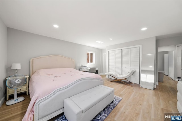 2180 Center 4B, Fort Lee, NJ 07024 - bedroom featuring light wood-style floors, baseboards, and recessed lighting