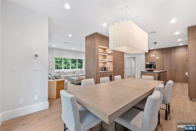 10 Kensington Ct, Tenafly, NJ 07670 - dining area with light wood-type flooring, baseboards, and recessed lighting