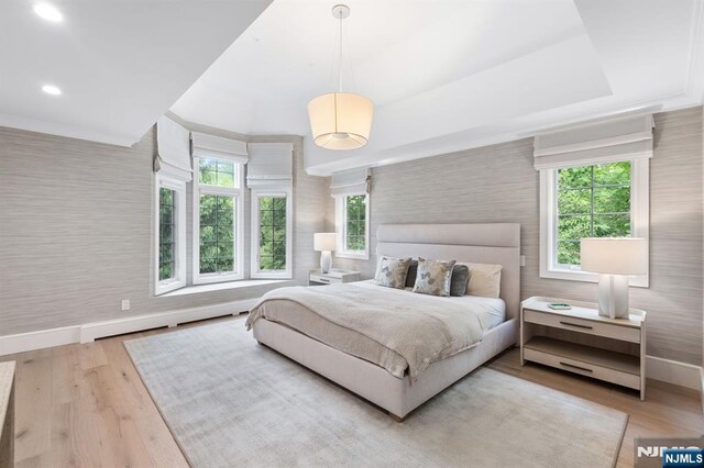 10 Kensington Ct, Tenafly, NJ 07670 - bedroom featuring baseboards, wallpapered walls, wood finished floors, and recessed lighting