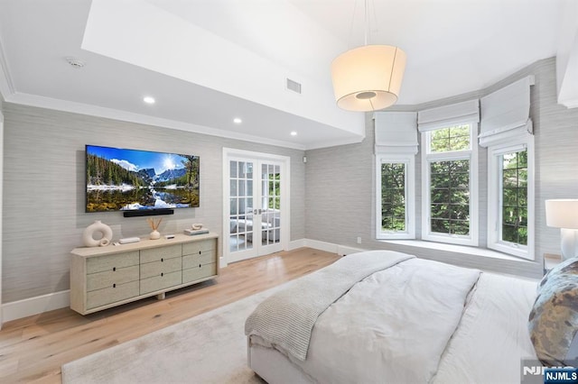 10 Kensington Ct, Tenafly, NJ 07670 - bedroom with wallpapered walls, baseboards, french doors, light wood-style flooring, and ornamental molding