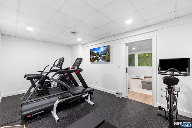 10 Kensington Ct, Tenafly, NJ 07670 - workout area featuring a baseboard heating unit, baseboards, a paneled ceiling, and recessed lighting