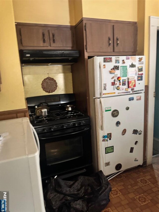 1632 Willever St, Plainfield, NJ 07063 - kitchen with freestanding refrigerator, black range with gas cooktop, and extractor fan