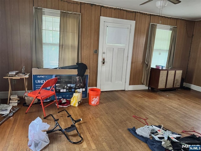 1632 Willever St, Plainfield, NJ 07063 - interior space featuring healthy amount of natural light, wood finished floors, wood walls, and ceiling fan