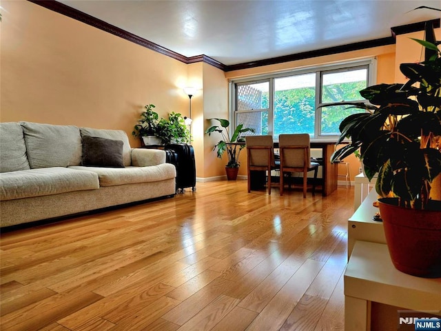 6600 Jfk Blvd E Unit 3J, West New York, NJ 07093 - living area featuring ornamental molding, wood finished floors, and baseboards
