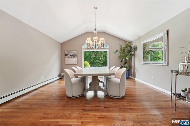 15 Fred St, Old Tappan, NJ 07675 - dining room featuring a chandelier, plenty of natural light, vaulted ceiling, baseboard heating, and light wood finished floors
