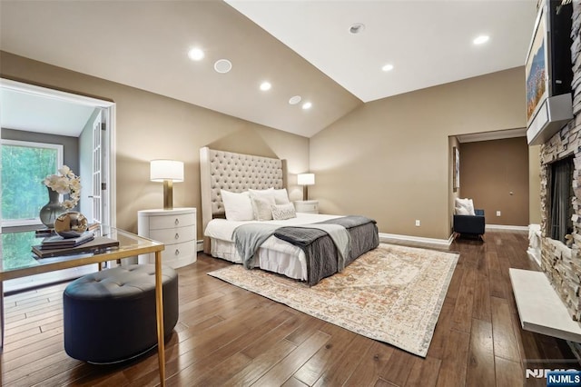 15 Fred St, Old Tappan, NJ 07675 - bedroom with dark wood-style flooring, vaulted ceiling, recessed lighting, baseboards, and a fireplace