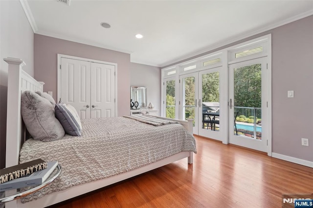 15 Fred St, Old Tappan, NJ 07675 - bedroom with access to exterior, crown molding, french doors, wood finished floors, and recessed lighting