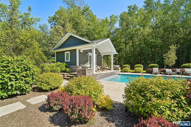 15 Fred St, Old Tappan, NJ 07675 - swimming pool featuring an exterior structure, an outdoor structure, and a patio