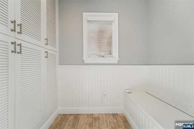 15 Fred St, Old Tappan, NJ 07675 - detailed view of wood finished floors, a wainscoted wall, and baseboards