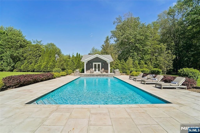 15 Fred St, Old Tappan, NJ 07675 - swimming pool featuring an exterior structure, an outdoor structure, and a patio