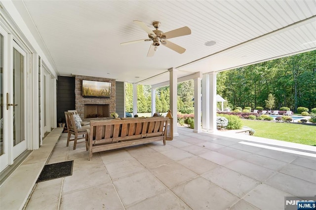 15 Fred St, Old Tappan, NJ 07675 - view of patio / terrace featuring an outdoor stone fireplace and ceiling fan