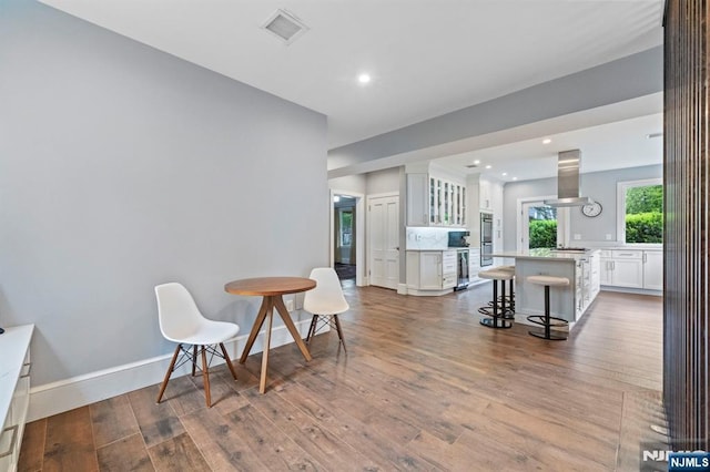 296 Highfield Ln, Nutley, NJ 07110 - sitting room with wood finished floors, baseboards, beverage cooler, and recessed lighting