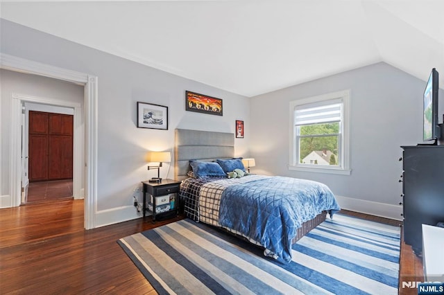 296 Highfield Ln, Nutley, NJ 07110 - bedroom with dark wood-style flooring, baseboards, and lofted ceiling