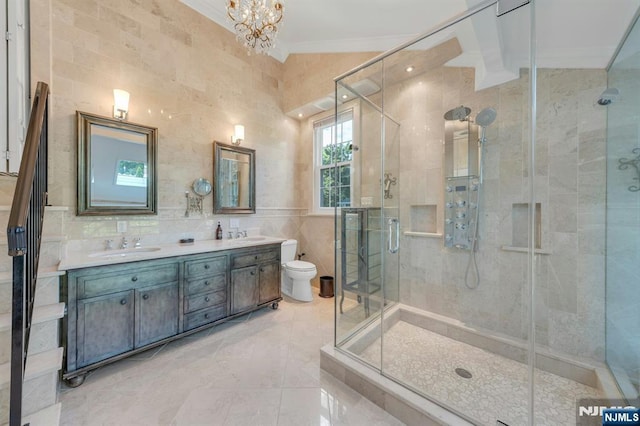 248 Camden St, Oradell, NJ 07649 - full bath featuring crown molding, a stall shower, double vanity, tile walls, and a chandelier
