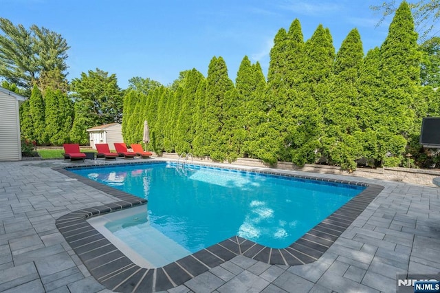 248 Camden St, Oradell, NJ 07649 - swimming pool featuring a patio